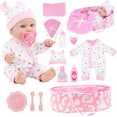 Zita Element 12-inch baby doll resting in sleeping basket for nurturing play