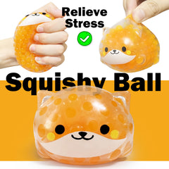ZTATU orange Shiba Inu stress ball close-up highlighting tactile elastic beads for calming focus.