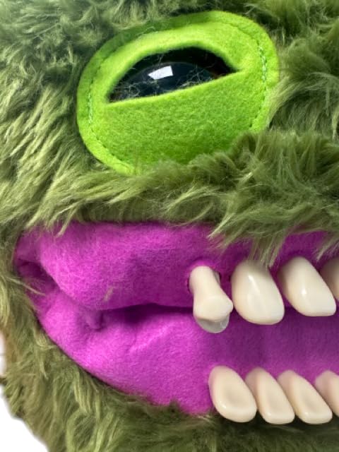 Close-up of human-like teeth on ZURU Fugglers Chuckles for quirky charm.