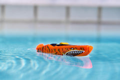 ZURU Robo Alive S001 racing in water demonstrating three-direction motion