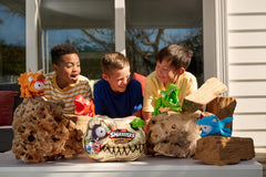 ZURU SMASHERS Sand and slime digging scene revealing dino pieces