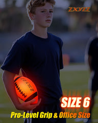Zxyzz glow football in nighttime backyard play with friends
