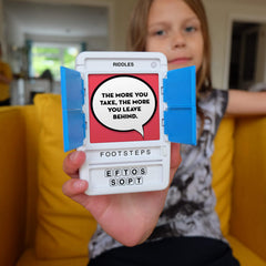 Pocket-size 100 PICS Riddles Travel Game fits bags for screen-free travel fun