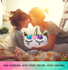 2Pepers unicorn pillow kit decorative pieces like felt flowers and glitter stickers add flair.