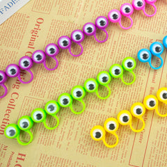 3 otters eyeball ring puppet in orange aids party favors and party games