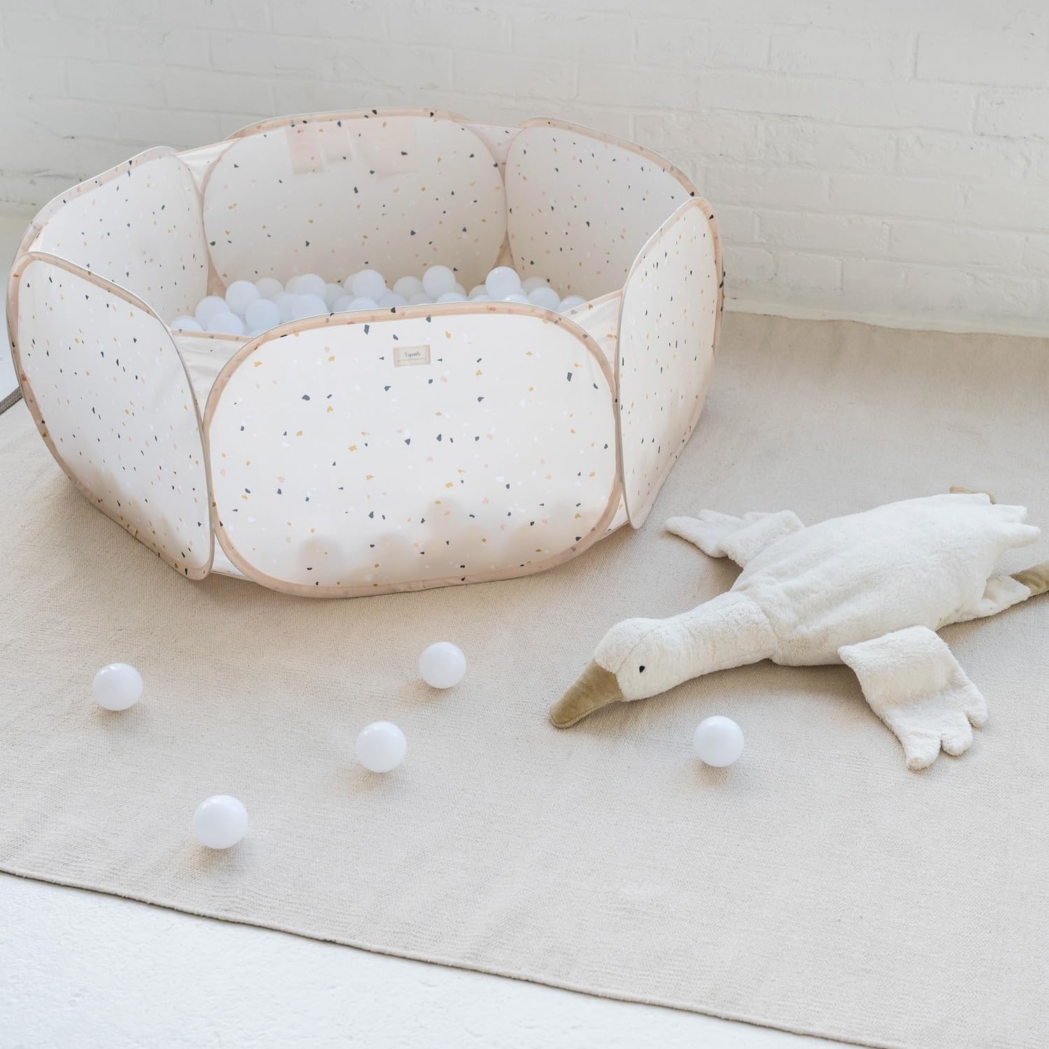 3 Sprouts terrazzo beige design fits modern playrooms.