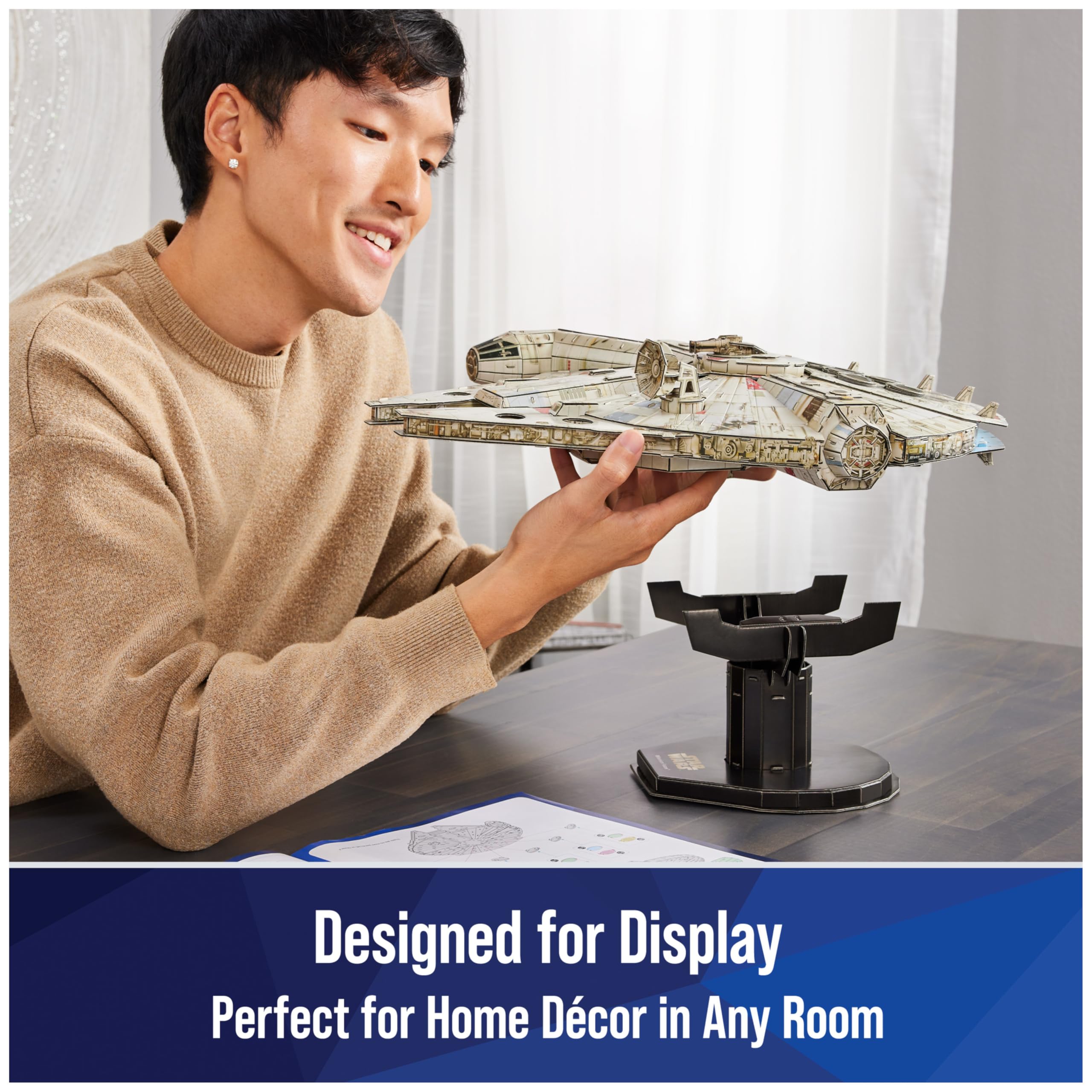 4D Build Millennium Falcon sits among Star Wars collection and room decor.