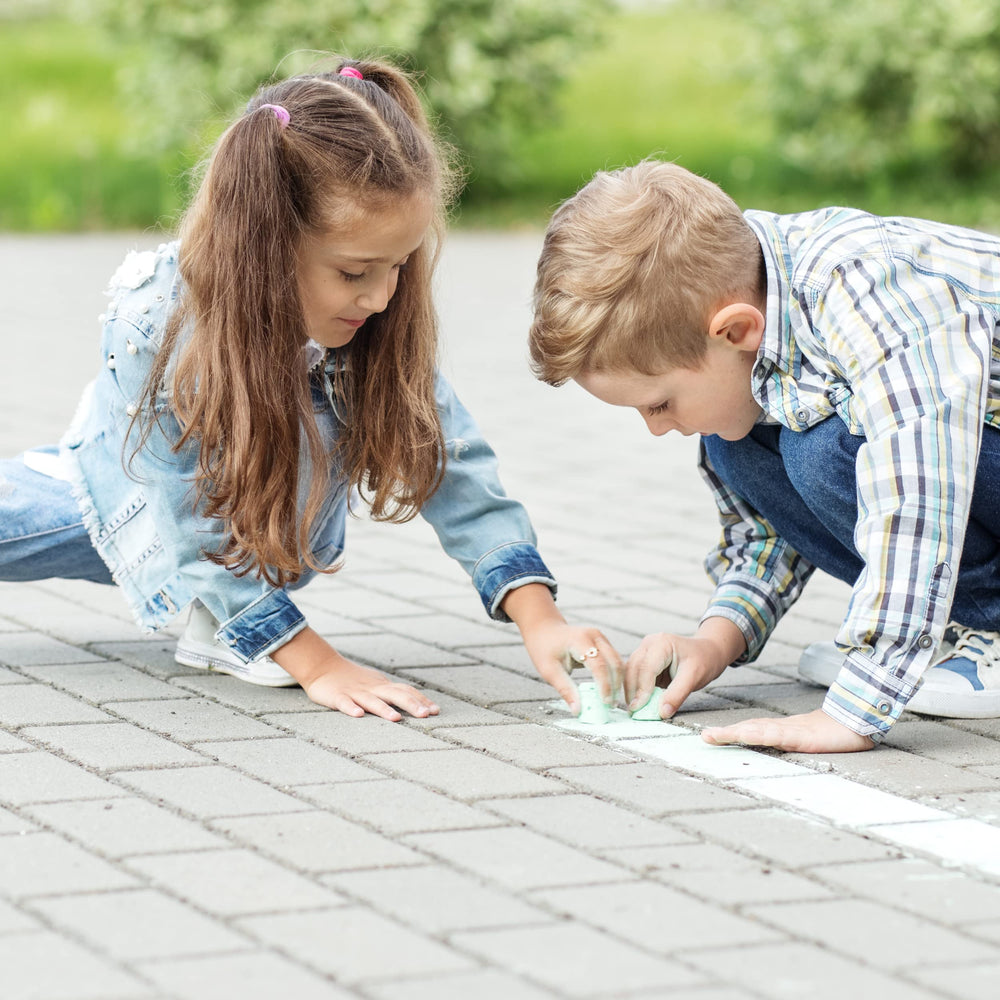 Outdoor art activity with 4E's Novelty chalk and playground setting