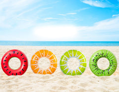 90shine pool party setup with fruit floats invites sunny moments