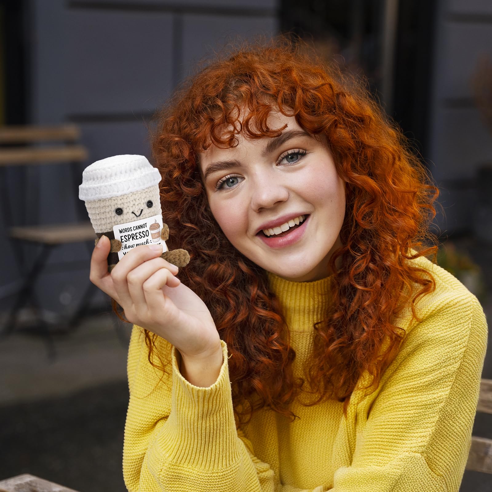 A AIFAMY Positive Coffee doll on display as cute decor with cheerful appeal