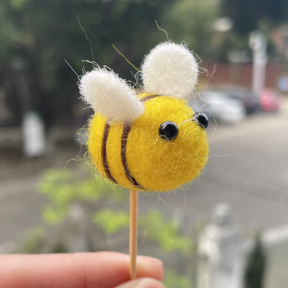 AcceLeah bee felt ball adds playful charm to party tables and crafts.