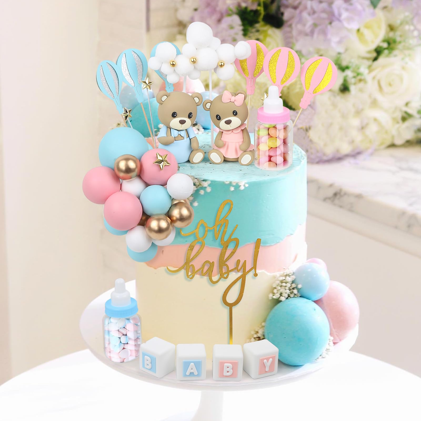 Acmee oh baby cake topper adds a charming sentiment to celebrations.