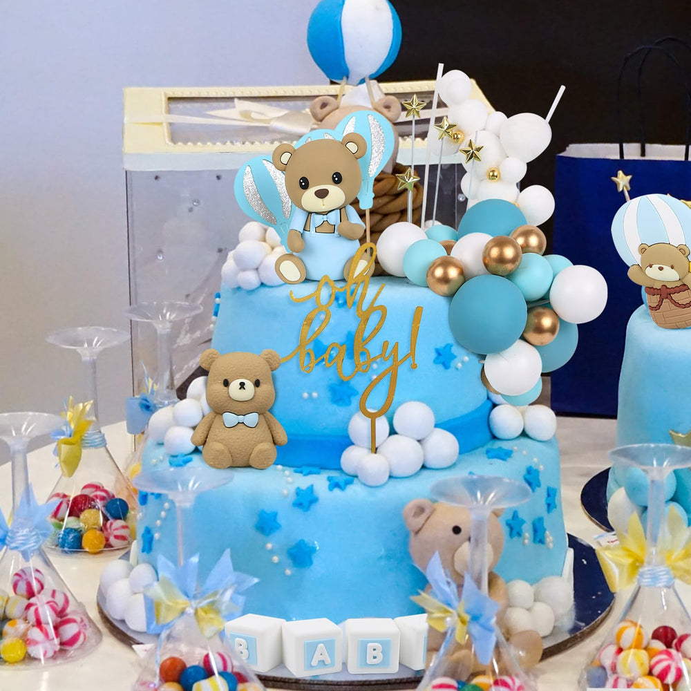 Acmee 'oh baby' topper with cloud accents for whimsy.