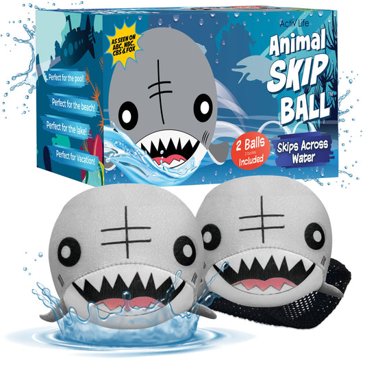 Activ Life Skip Ball shark toy on the beach encourages outdoor play and social fun.