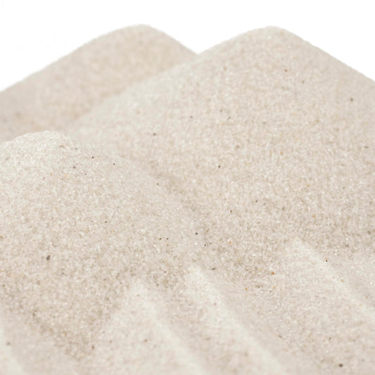 Activa White Scenic Sand in a bottle shows vibrant color layers for art projects