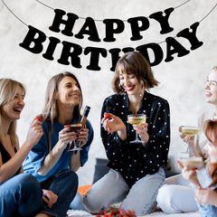 Adecortalk Birthday Banner used as a fireplace backdrop for gatherings.