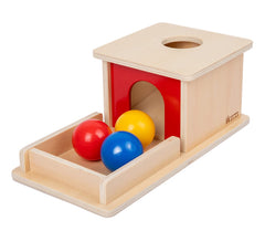 Adena Montessori object permanence box with three balls and red door for early learning.