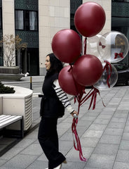 Adeyoo maroon and gold arch centerpiece balloons create focal decor.