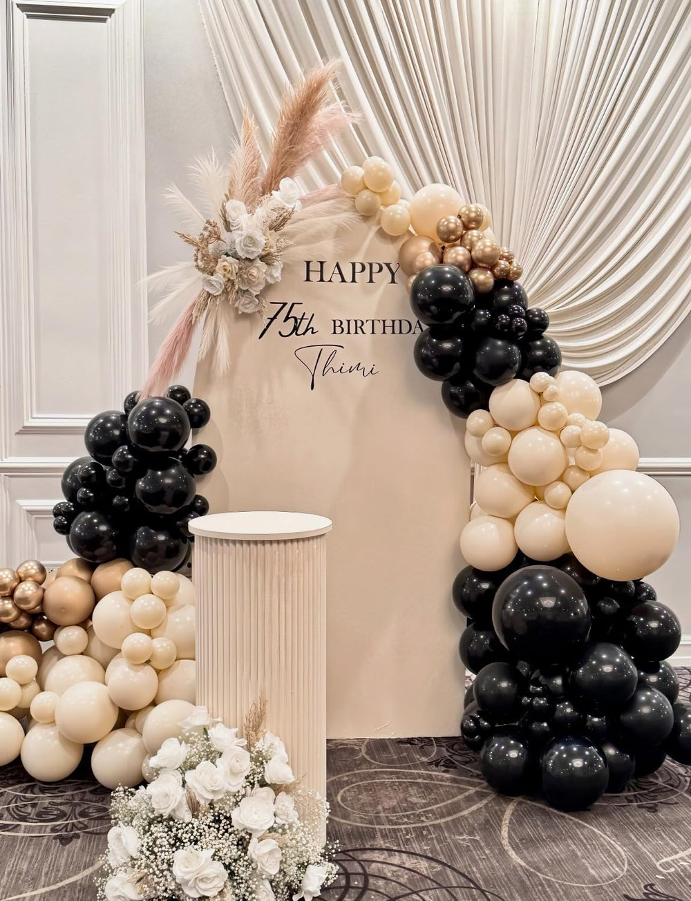 Champagne metallic balloons add a luxe touch to any setup.