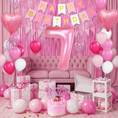 Adorely pink cake topper provides a sweet accent for the birthday cake.