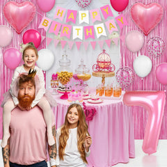 Adorely pink foil heart balloons bring a romantic touch to the celebration.