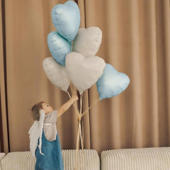 Adorely baby shower and wedding decor with soft blue heart balloons.