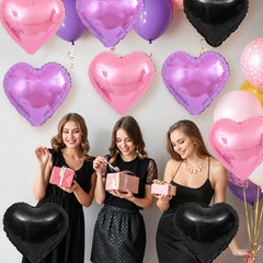 Adorely black heart foil balloon creates dramatic contrast for photos