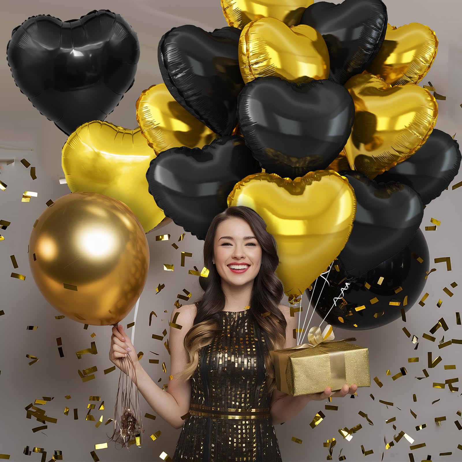 Adorely elegant party decor setup featuring black and gold balloons