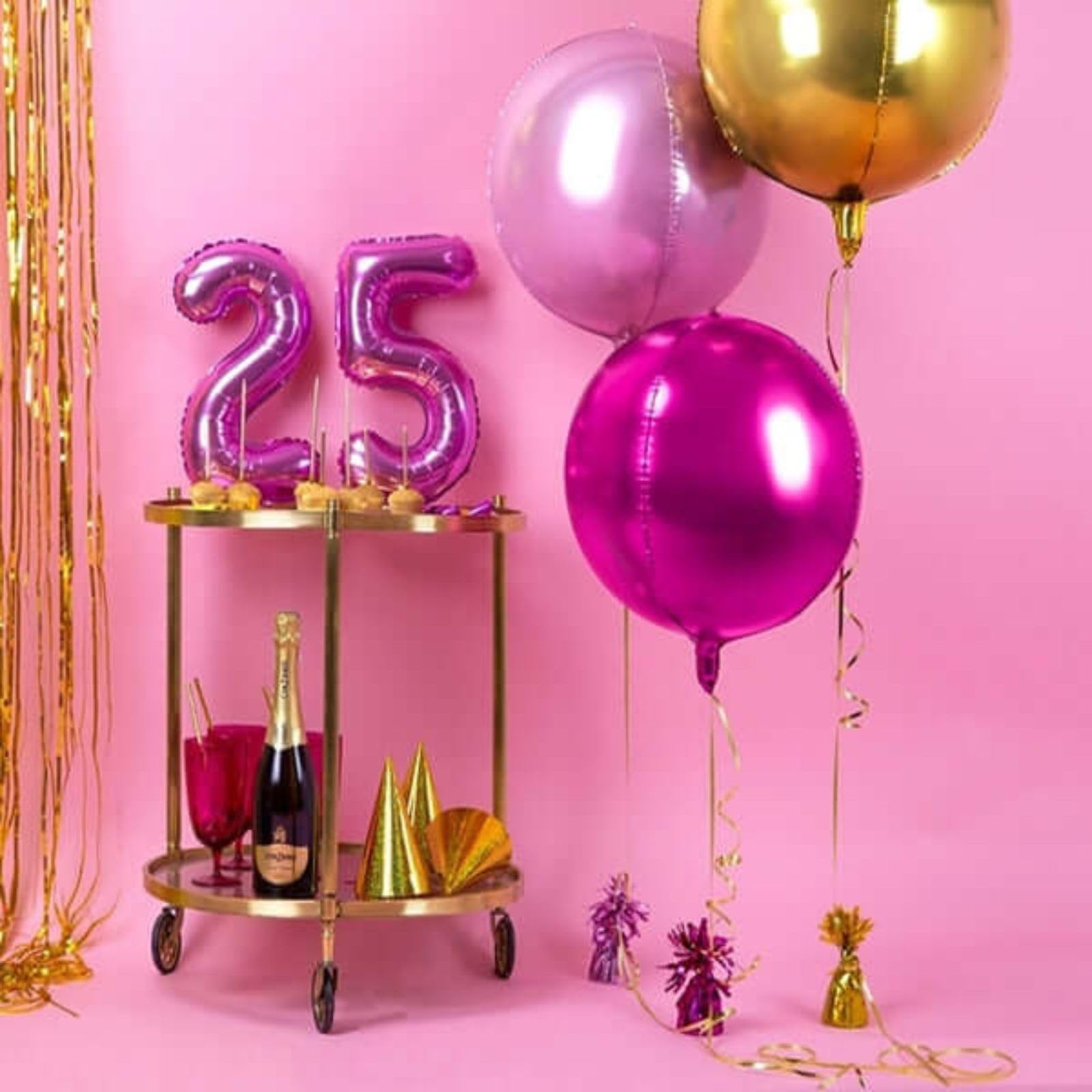 Adorely hot pink round balloons ideal for birthdays, anniversaries, and weddings.