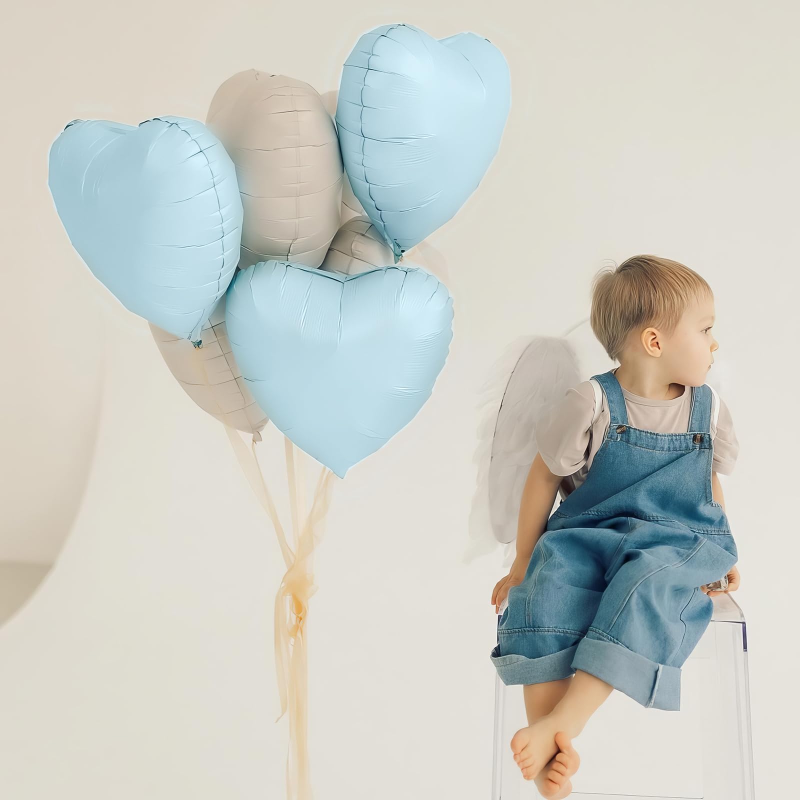 Adorely photo backdrop using heart balloons creates memorable moments.