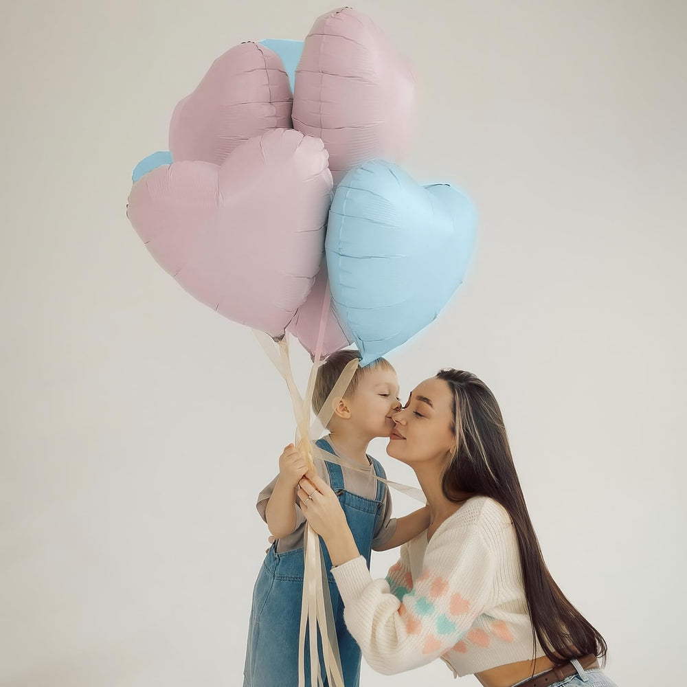 Adorely pink heart foil balloons decorate wedding arches with romantic ambiance