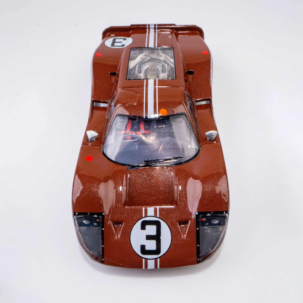 AFX Ford GT40 Mark IV side profile highlights sleek lines for display.