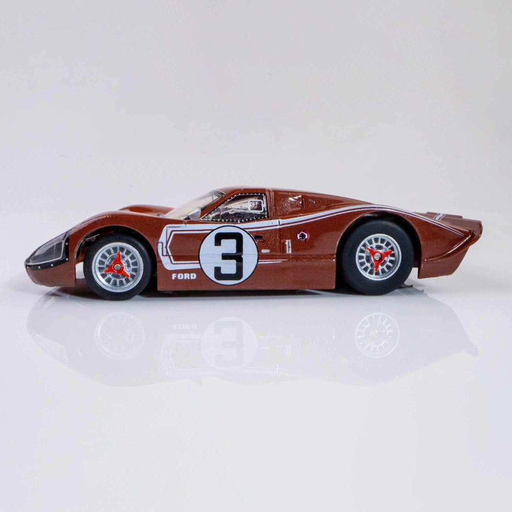 AFX Ford GT40 Mark IV wheel assembly captures race stance.