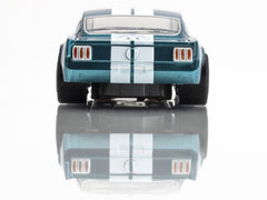 AFX Shelby GT350R 1965 Donohue track-action shot illustrates fast-paced racing potential.