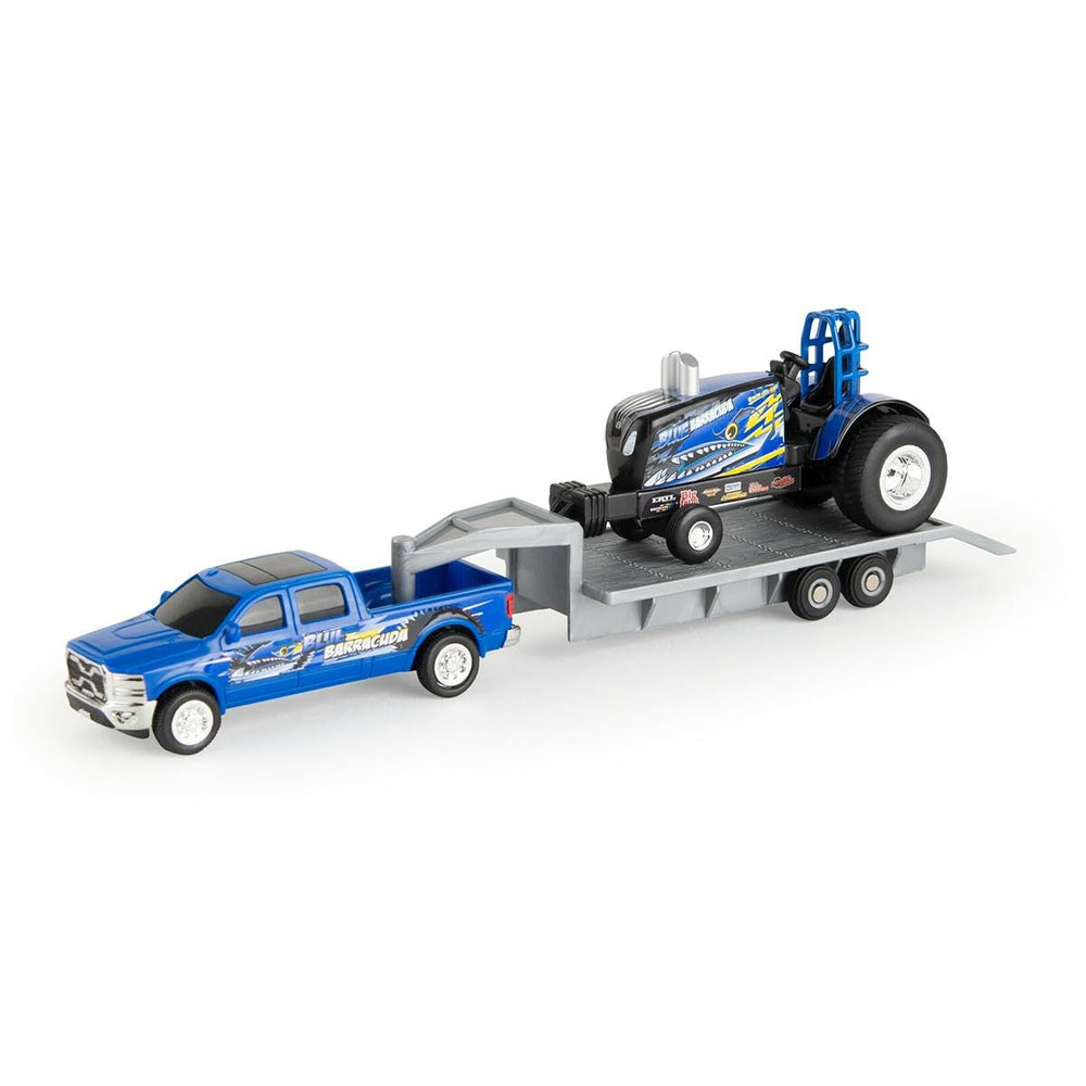 Agriculture New Holland Blue Barracuda pulling tractor for display.