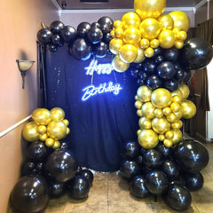 AIOZX black and gold balloons with ribbons for quick decorating.