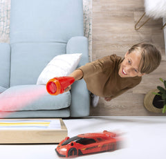 Air Hogs Zero Gravity Laser controller guides the light chase for precise turns.