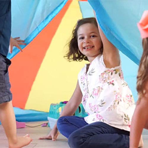 Kids playing inside Air Fort highlighting imaginative play