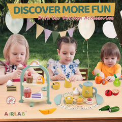 Four wood food toys accompanying Airlab tea set for storytelling