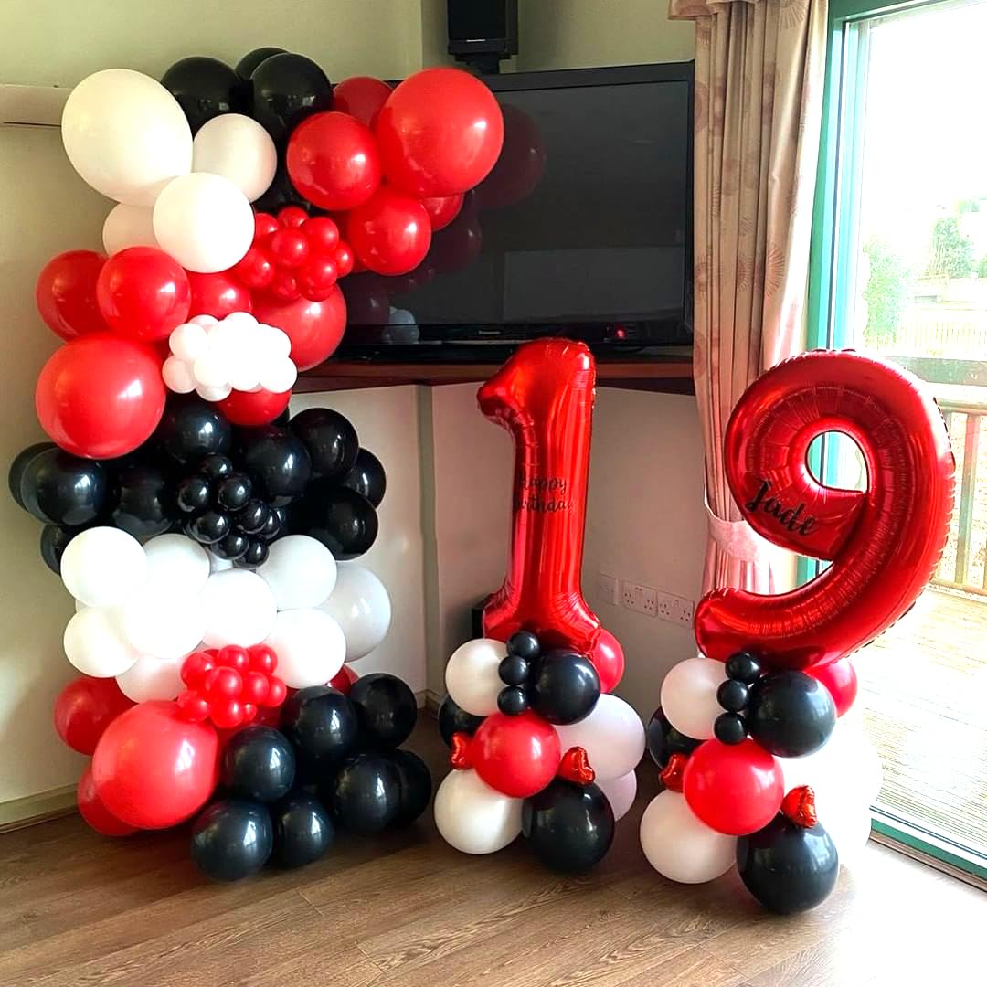 Aiwolf casino or race party vibes with bold color clash via balloons.