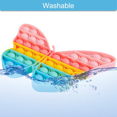 AIZIXIN Pop Bubble Toy on a desk; portable sensory relief anywhere