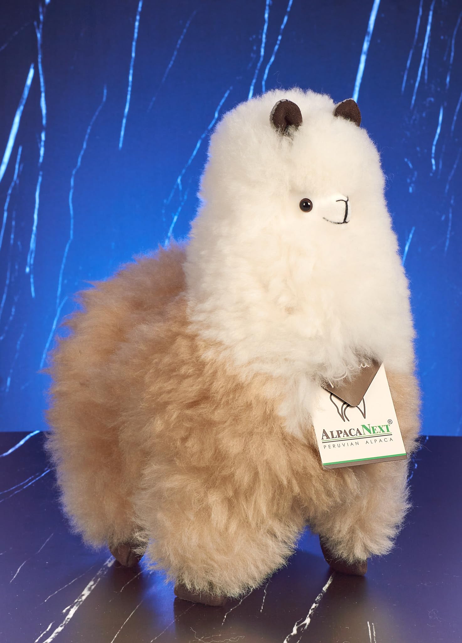 AlpacaNext 12-inch alpaca stuffed animal, soft plush for cozy hugging.