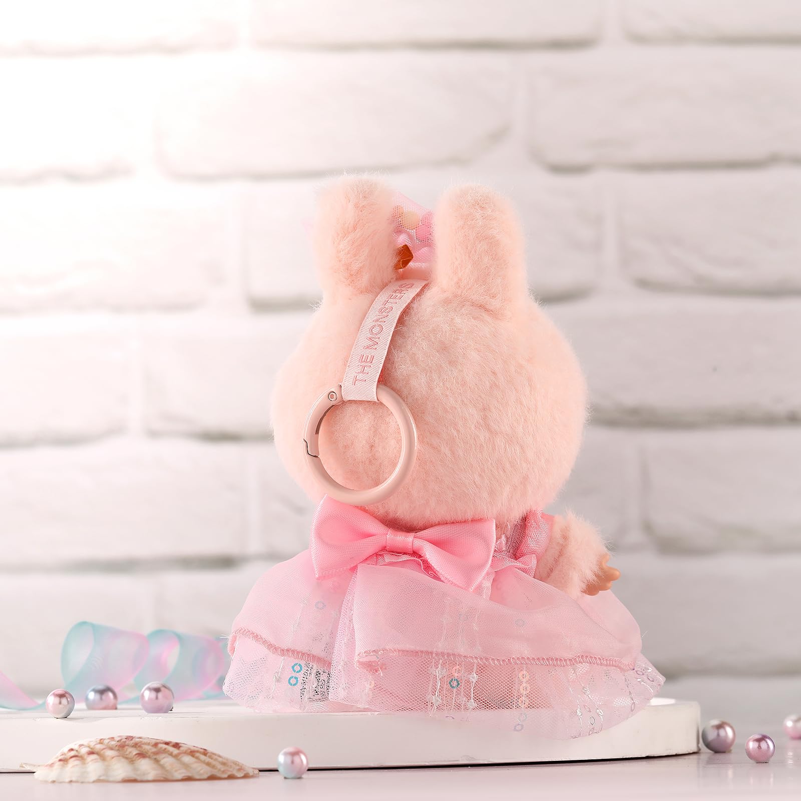 ALTRJO Labubu packaging includes dress and hairband for quick styling.