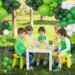 Green party backdrop arch setup using Amandir kit for events.