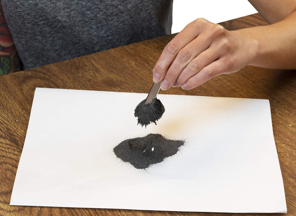 American Heritage iron filings pouring image emphasizes easy handling in class.