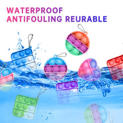 Amicbng durable silicone material used in mini pop keychain for long-lasting play