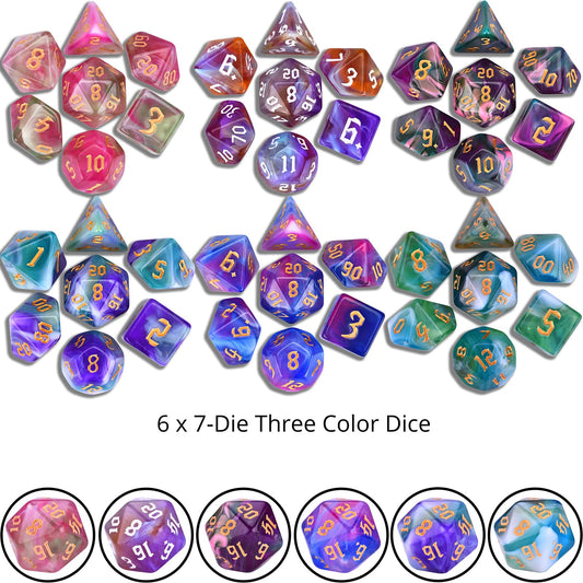 Amiven tri color dice with golden numbers and swirls for elegant game moments.