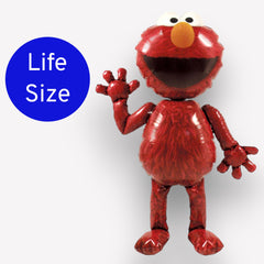 Close-up of the glossy red Elmo AirWalker foil surface for photo moments.