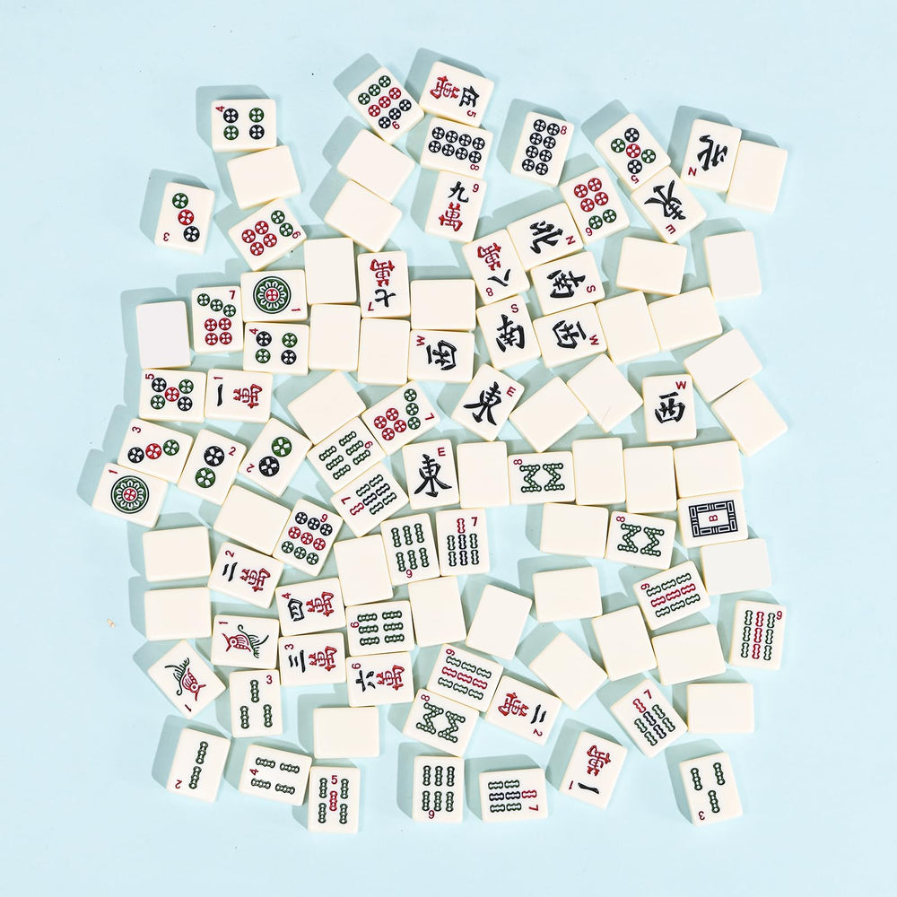ANABIUP ivory-white tiles bring an elegant, versatile look to any table.