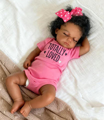 Anano black reborn doll face close-up showing lifelike features for imaginative play